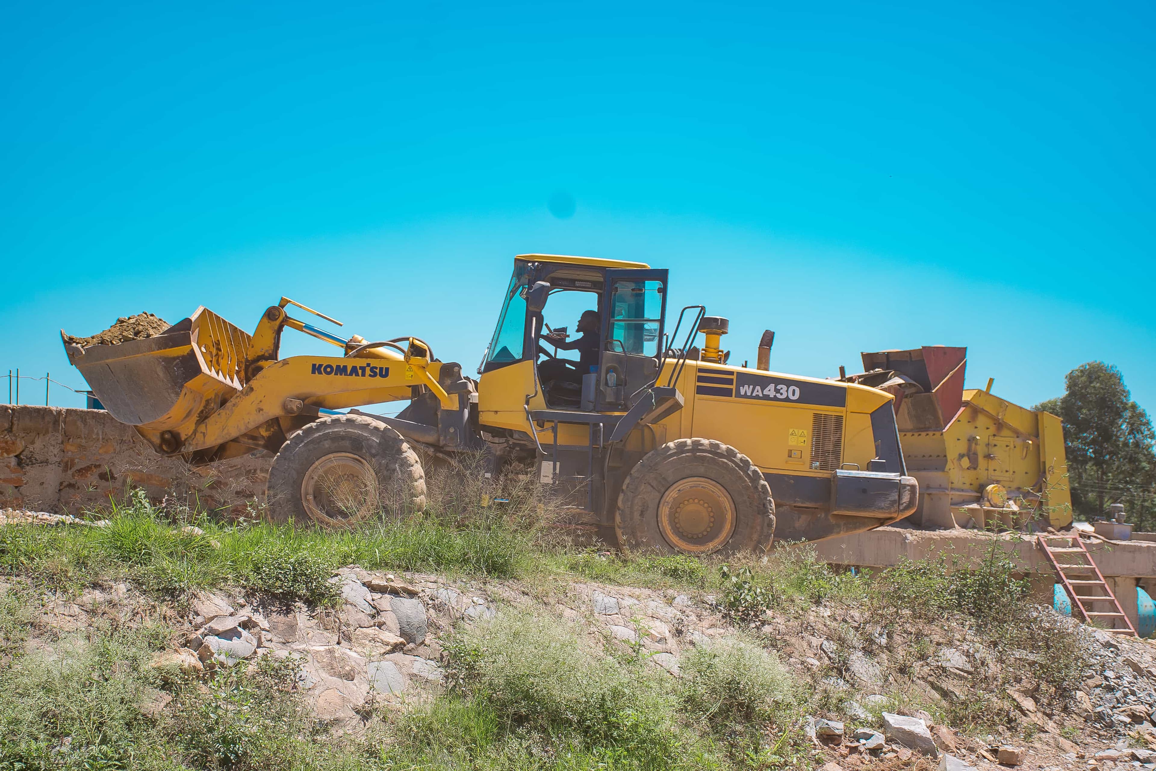 Heavy Machine Carrying Earth